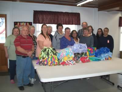 Blue Star Moms and Dads around table with no sew blankets