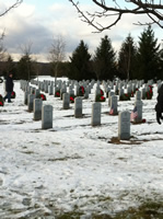 Headstones with wreaths at Saratoga National Cemetery