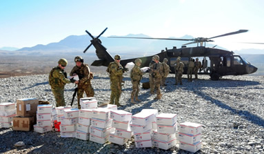 unloading boxes from helicopter